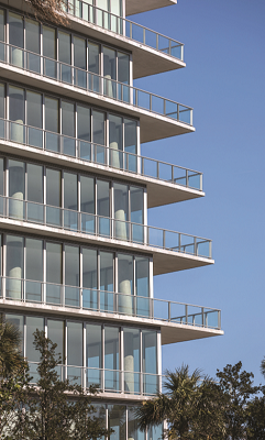 The condominium complex includes hurricane-resistant window walls, glass doors, and metal framing systems finished with fluoropolymer coatings. Photo courtesy of PPG. 