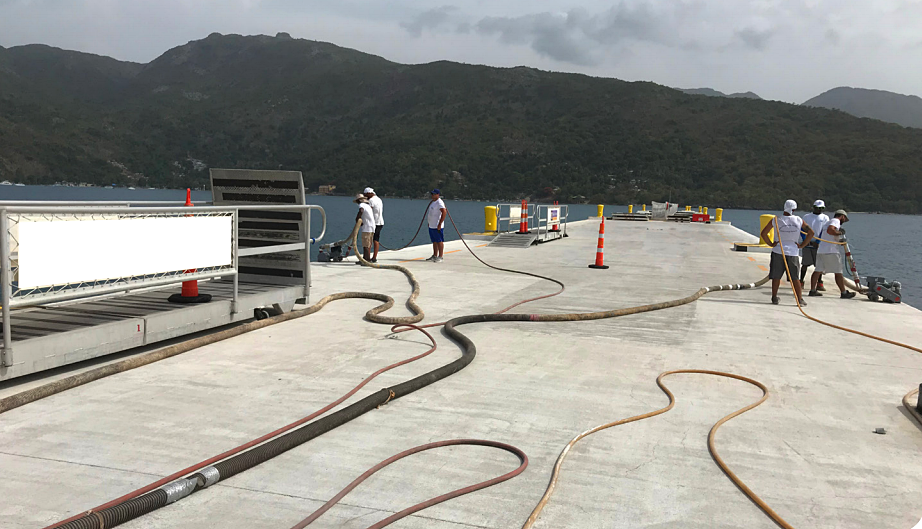 Surface preparation works on the pier. Photo courtesy of DESCO Manufacturing.