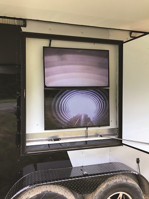 The robotic system traveling inside a pipe, as shown on video. Image courtesy of ProFoam, LLC.