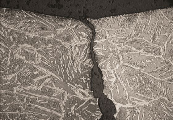 Fig. 5 Optical micrograph showing “stepped” crack morphology.