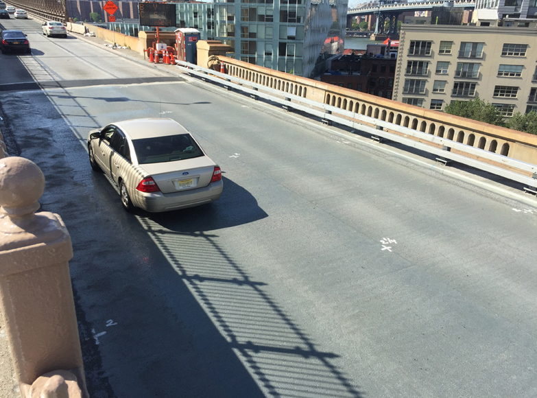 A high-performance, spray-applied waterproofing applied to the Brooklyn Bridge deck provided an alternative to sheet goods and sacrificial, short-term liquid sealants. Photo courtesy of Bridge Preservation.
