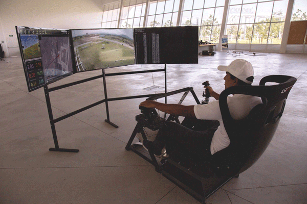 FIGURE 3: A pilot sits in a virtual cockpit, where he monitors the UAV’s altitude, speed, and remaining battery power from the ground. Photo courtesy of Corrosión y Protección. 