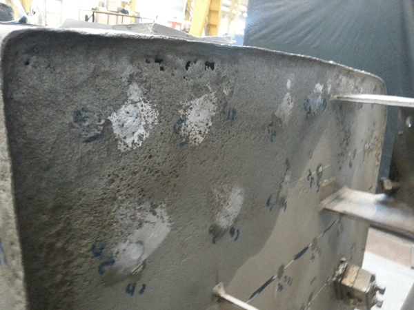FIGURE 2: The bottom of the corroded diesel tanks from the trains often featured pitting and holes, as shown here. Photo courtesy of Belzona.