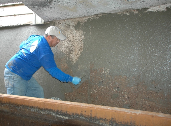 With proper crack repair and surface preparation, the polyurea coating can be applied directly to the concrete. Photo courtesy of VersaFlex.